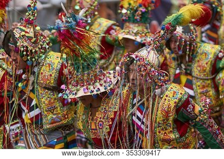 Oruro, Bolivia - February 26, 2017: Tinkus Dance Group In Ornate Costumes Performing As They Parade 