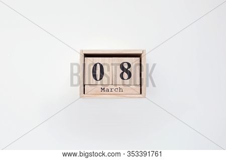 Wooden Block Calendar On White Background. Top View. Calendar Women Day. Copy Space. Background For 