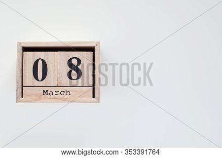 Wooden Block Calendar On White Background. Top View. Calendar Women Day. Copy Space. Background For 
