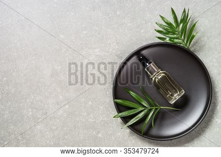 Hyaluronic Acid, Botulin, Face Serum In Vial At Stone Table. Flat Lay Image With Copy Space.
