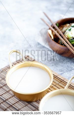 Makgeolli Rice Wine Is One Of The Oldest Korean Traditional Fermented Alcoholic Drinks Close-up. Hea
