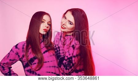 2 Girls In The Same Things With Bright Makeup. Brunette Girls, Sisters, Girlfriends, Twins. Women's 
