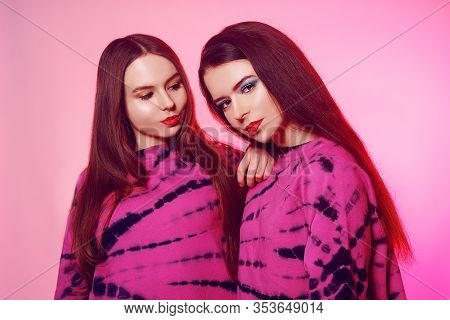 2 Girls In The Same Things With Bright Makeup. Brunette Girls, Sisters, Girlfriends, Twins. Women's 
