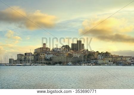 Talamone Village Skyline, Marina And Medieval Fortress Rocca Aldobrandesca At Sunset. Italian Travel