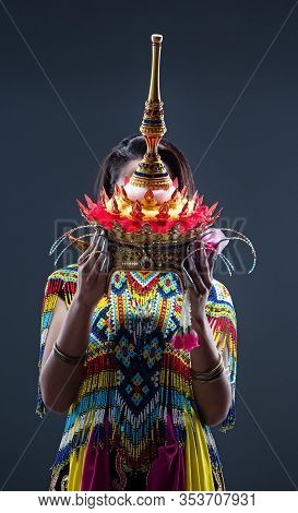 Young Lady Wearing Thai Tradition Southern Costume ,made From Colorful Beads,put Headdress On Her He