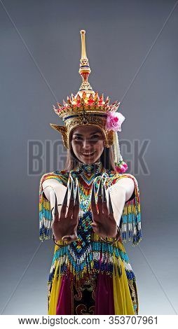 The Beautiful Woman Wearing Thai Southern Folk Dancing Costume,made From Colorful Bead,showing How T