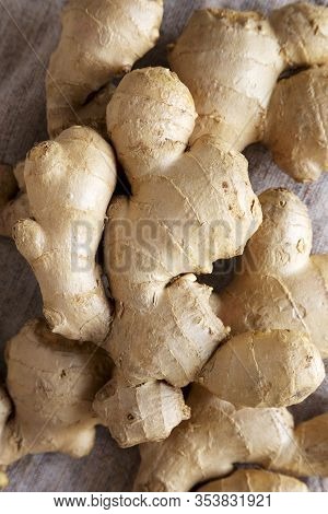 Raw Organic Ginger Root On Cloth, Top View. Flat Lay, From Above, Overhead. Close-up.