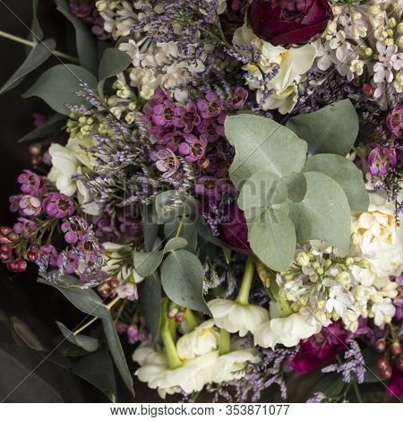 Variety Of Colors Near The Liberty Store In London. Large Bouquets In Tin Vases.