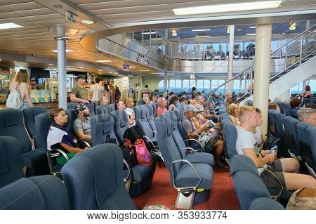Greece, Crete. 11-09-2019. Passengers Sitting In Cabin Of Greek Ferry Seajets, Trip Heraklion Port D