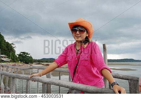Travelers Thai Women On Wooden Bridge Pier Boat In Sea Ocean On Eastern Shore Of The Gulf Of Thailan