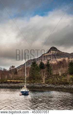Beautiful Winter Landscape View Along Loch Leven Towards Snowcapped Mountains In Distance With Moore