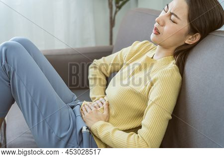 Flatulence Young Asian Woman, Girl Hand In Stomach Ache, Suffer From Food Poisoning, Abdominal Pain 