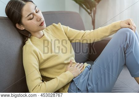 Flatulence Young Asian Woman, Girl Hand In Stomach Ache, Suffer From Food Poisoning, Abdominal Pain 
