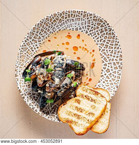 Plate of mussels with creme dubarry in restaurant