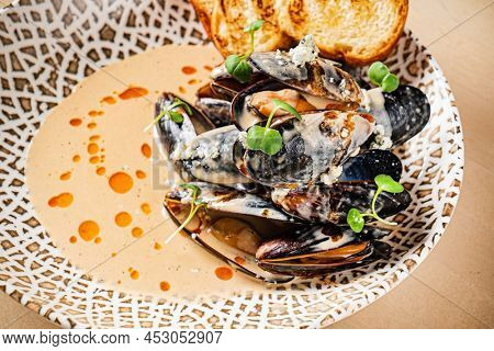 Plate of mussels with creme dubarry in restaurant