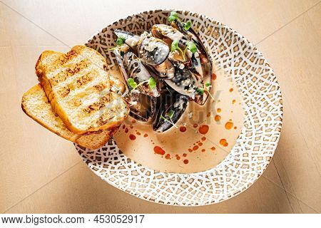 Plate of mussels with creme dubarry in restaurant