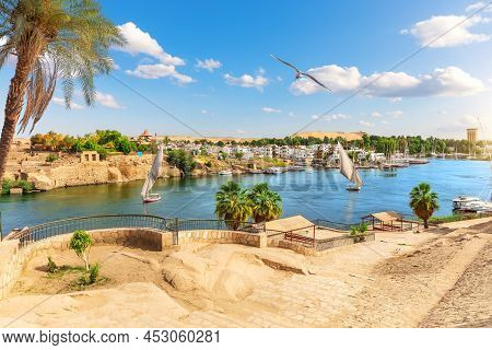 Traditional View Of Aswan By The Nile River And Sailboats, Egypt