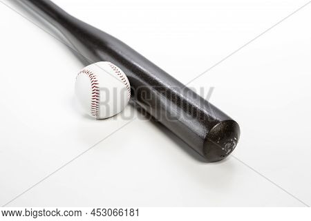 Sport Concepts. Closeup Of Brown Wooden Baseball American Bat Along With Leather Ball Placed Togethe