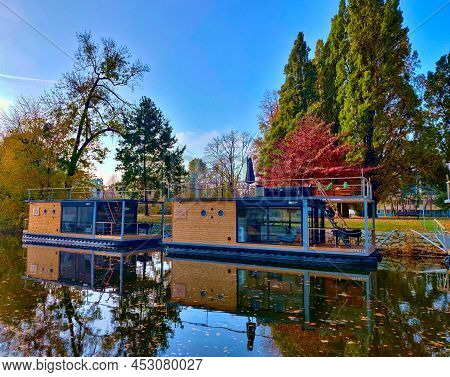 Ceske Budejovice, Czech Republic - October 31, 2021: Two Beautiful Modern Wooden Houseboats With Aut