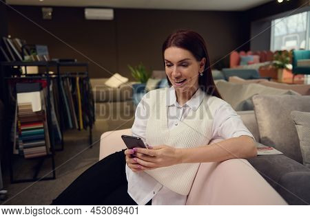 Interior Designer- Charming Elegant Brunette Middle Aged Caucasian Woman In Casual Attire Typing Tex