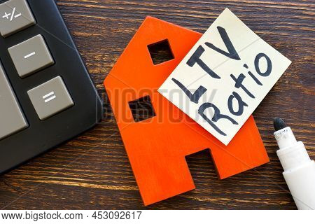 Loan-to-value Ltv Ratio Sign On The Sticker And Model Of Home.