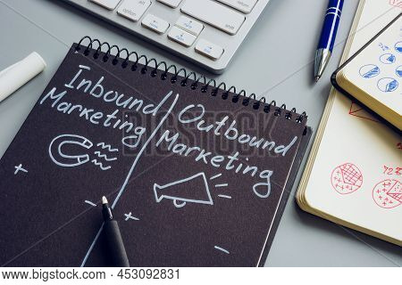 Inbound And Outbound Marketing Pros And Cons In The Notepad.