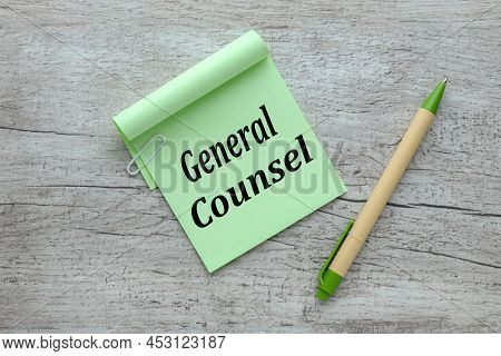 General Counsel. Text On Green Sticky Note On Wooden Table