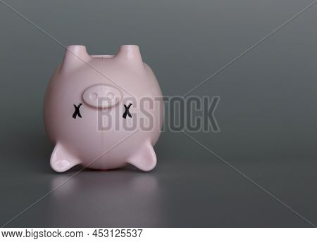 Dead Piggybank With Copy Space. Bankruptcy, Business Closure, Economic Crisis, Recession Concept.