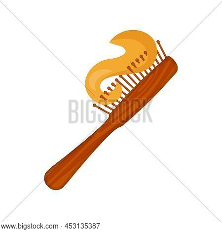 Lock Of Blond Hair In A Comb