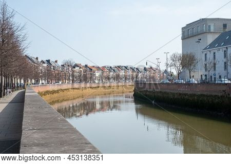 Mechelen, Malin, Antwerp, Belgium, March 28, 2022, View Of River Dijle Embankment With Picturesque B