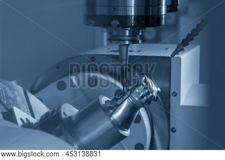 The 5-axis  Machining Center Cutting The Sample Parts With Solid Ball Endmill Tool. The High Technol