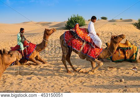 Thar Desert, Rajasthan, India - October 15th 2019 : Camel Owners With Camels,camelus Dromedarius, At