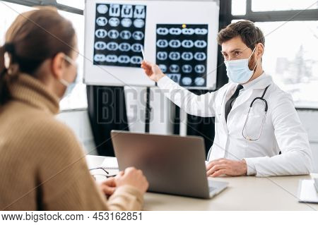 Unhealthy Girl Came To The Doctor For A Consultation. Caucasian Smart Doctor, Therapist, Pulmonologi