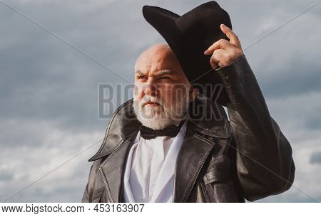Handsome Fashion Senior Old Mature Man. Elderly Mature Greybeard. Close Up Face Portrait Of Senior. 