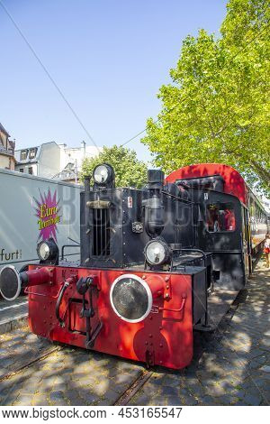 Frankfurt, Germany - July 18, 2021: Old Historic Train Operates In The Nizza Area, The Main River Pr