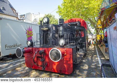 Frankfurt, Germany - July 18, 2021: Old Historic Train Operates In The Nizza Area, The Main River Pr