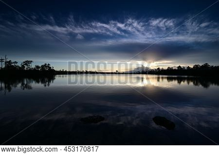 Beautiful Sunset Cloudscape Over Pine Glades Lake In Everglades National Park, Florida Reflected In 