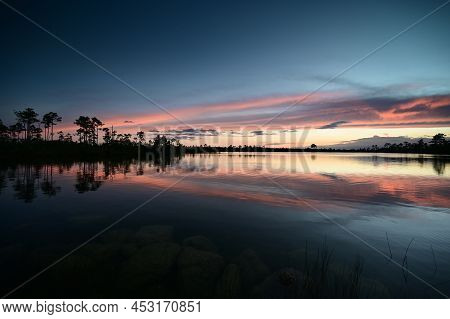 Beautiful Sunset Cloudscape Over Pine Glades Lake In Everglades National Park, Florida Reflected In 