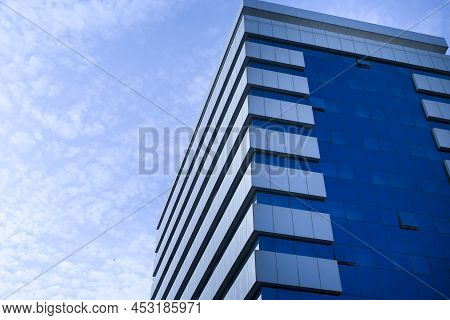 Rectilinear And Geometric Facade With Glass Windows
