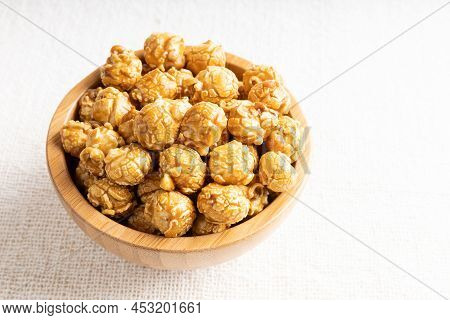 Caramel Popcorn In Bamboo Wooden Bowl