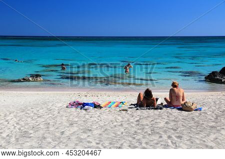 Crete, Greece - May 22, 2014: People Visit Beach In Elafonissi, Crete Island, Greece. Crete Attracts