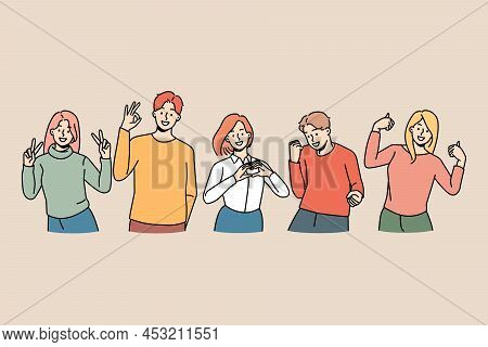 Smiling Diverse Young People Showing Hand Gestures Expressing Different Emptions. Happy Men And Wome