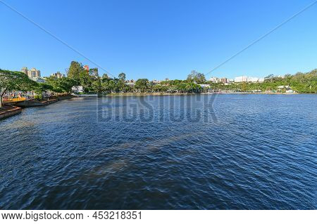 Londrina, Pr, Brazil - December 19, 2021: View Of Igapo Lake And The City Around On A Beautiful Blue