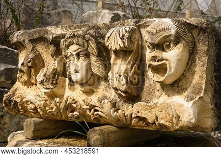 Stone Theater Masks In Myra Ancient City. Demre, Antalya, Turkey
