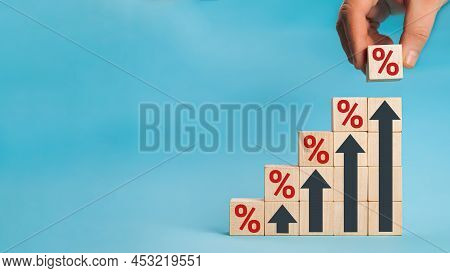 Wooden Blocks With Percentage Sign And Arrow Up, Financial Growt