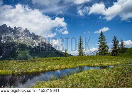 Mountain Pond With Wilder Kaiser Range Reflecting In Water, Tirol - Austria