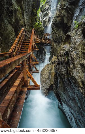 Wooden Hike Trail Path Inside A Gorge With Bue Mountain River, Sigmund Thun Klamm, Kaprun, Austria