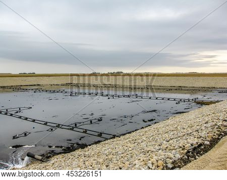 Installation Of Aeration Lines For Fine Bubbles In An Aerobic Wastewater Treatment Lagoon Constructi