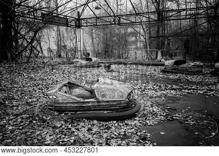 Abandoned Bumper Cars In The Amusement Park Of Pripyat City In Chernobyl Exclusion Zone, Ukraine. Bl