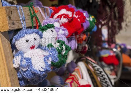 Masuleh, Iran - December 22, 2017 Colorful Handmade Knitted Dolls At Different Colors In Souvenir Ma